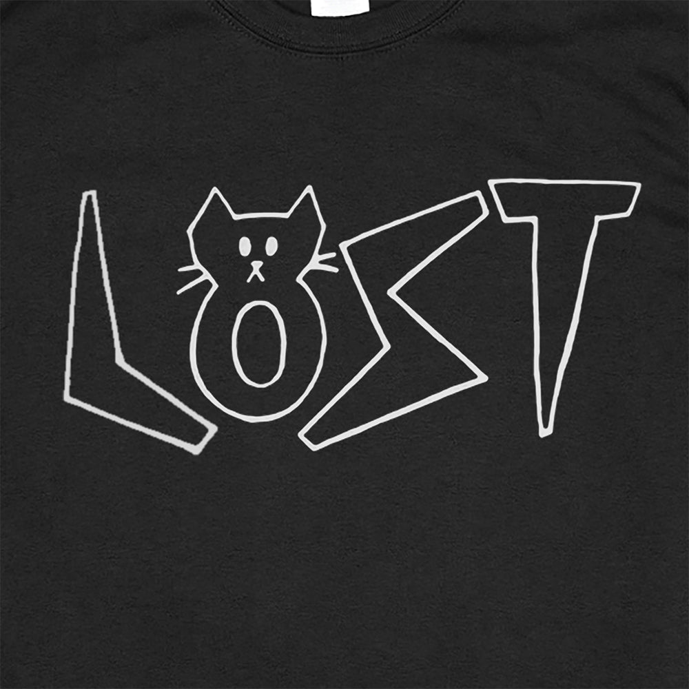 Detail view of Charlottes White Cat Letters. Hand drawn design of cat shaped letters. Drawn by my daughter Charlotte, and printed with white ink on a black cotton shirt.