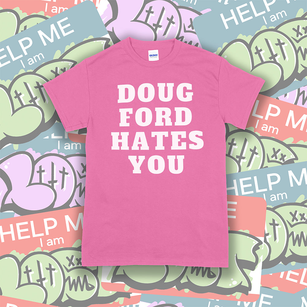 The original Doug Ford Hates You t-shirt. Bold white letters screen printed on a pink shirt. Colorful graffiti stickers make up the background.
