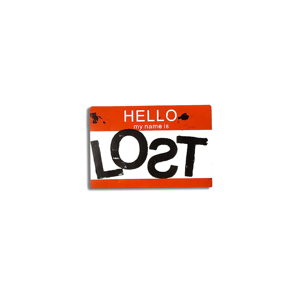 Hello my name is LOST sticker. A red and white nametag sticker stamped with the name LOST with a backwards S. The sticker is set against a plain white Background.