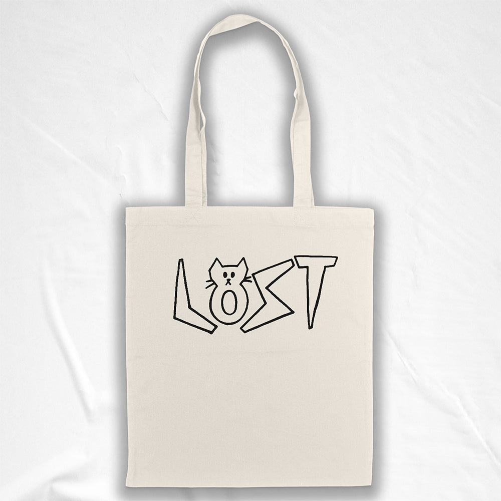 Cat shaped spell out the word LOST across a large tote bag. Hand drawn my my daughter Charlotte and printed in black on natural canvas tote bags.